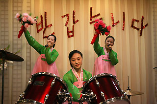 North Korean women perform in a North Korean restaurant in a hotel in Shanghai October 10, 2006.