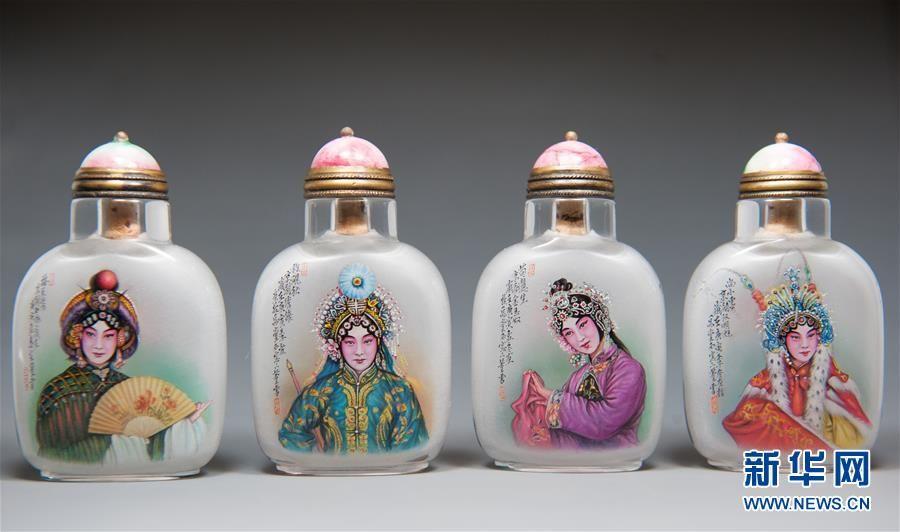 Passing on snuff bottle art skills